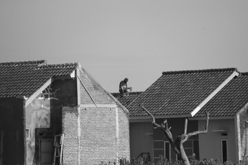 A worker on top