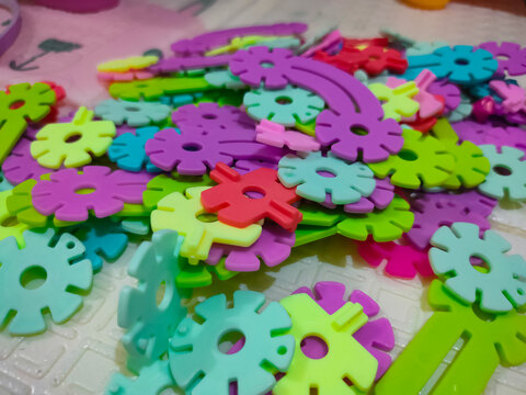 colorful children's toys puzzle bricks, creative block, bombik puzzle 
