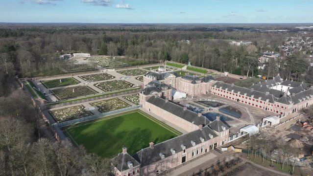 Experience the grandeur of the Dutch Royal Palace and its lush gardens from a unique top-down perspective with this stunning drone video.
