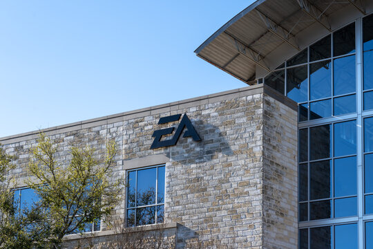 Austin,  Texas,  USA - March 18, 2022: EA logo sign on its office building in Austin,  Texas,  USA. Electronic Arts Inc. (EA) is an American video game company. 