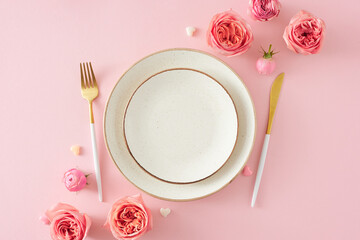 Festive setting concept for Mother's Day. Top view photo of empty plate cutlery knife fork natural...