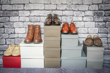 Modern men's shoes on shoe boxes