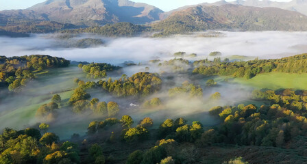 Fototapeta na wymiar Beautiful landscapes surrounded by green hill in England's Lake District