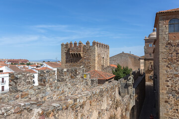 View at the medieval fortress and tower Bujaco, iconic Torre Bujaco, a heritage building on Plaza...