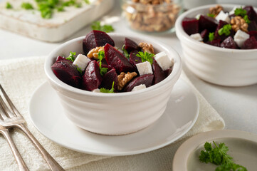 Beetroot salad with feta cheese and walnuts, top view