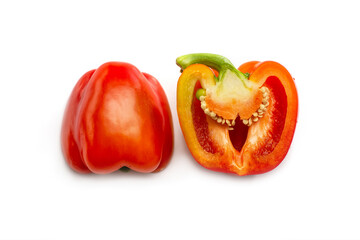 Fresh organic vegetable Bulgarian pepper, two cut halves , isolated