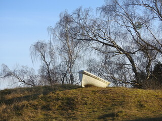 old boat abandoned on the hill