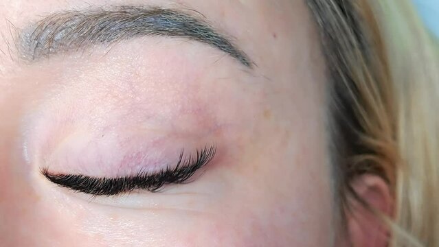 close up of eye with eyelash extensions ,beauty salon treatment