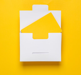 White packing box with yellow bank card on yellow background. Template for design