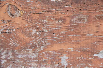 cracked red paint on blackboard background