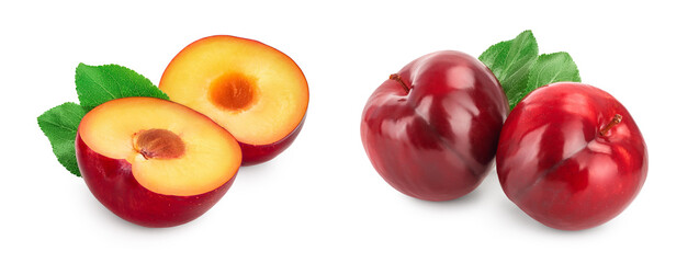 fresh red plum half with leaves isolated on white background