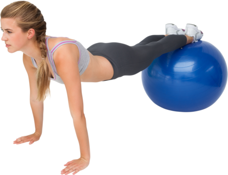 Full length of a fit woman stretching on fitness ball