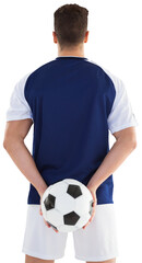 Rear view of sportsman holding football at his back