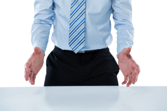 Midsection of businessman pretending to hold invisible object