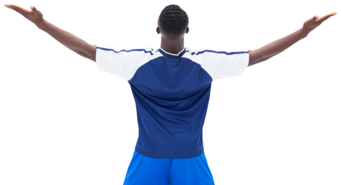 Football player celebrating with arms stretched