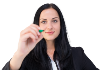 Pretty businesswoman writing with marker