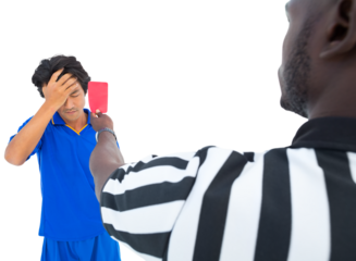 Upset player after getting red card from referee