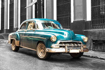 colorkey of old blue vintage classic american car in the streets of havana cuba