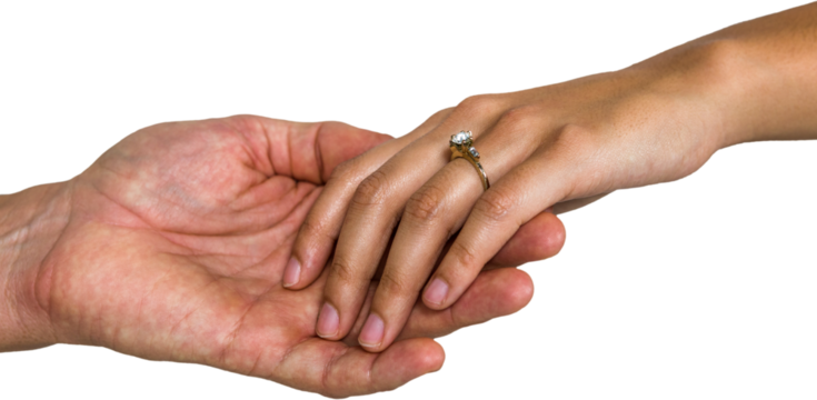 Close-up of couple holding hands - Powered by Adobe