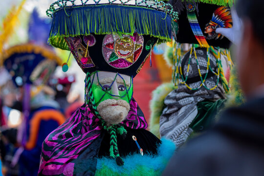 Close up of a chinelo dancer who is dancing in a carnival in Mexico