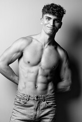 Fototapeta premium man torso bodybuilder muscle strong sexy jeans beauty person white studio arm