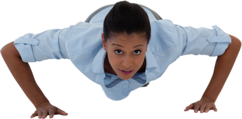 Businesswoman performing push ups