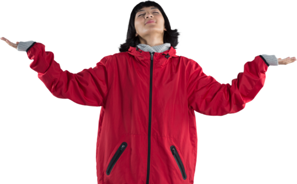 Blissful woman standing with arms outstretched - Powered by Adobe