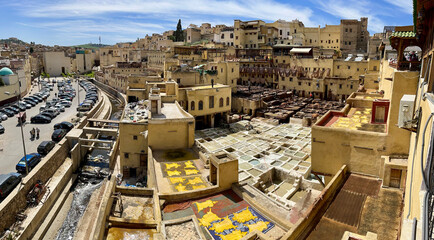 Fes, Morocco, Africa: aerial view of the tannery where workers dye the leather in stone tubs...