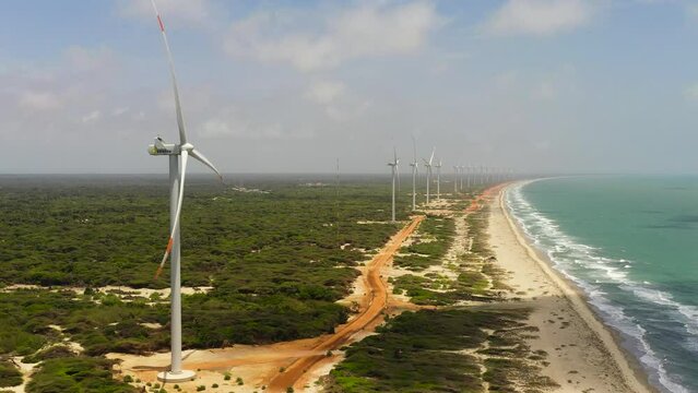 Wind turbines producing clean sustainable energy, clean energy future. Wind power plant. Mannar, Sri Lanka.