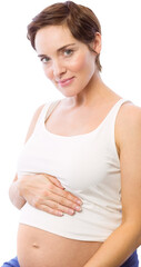 Pregnant woman smiling at camera