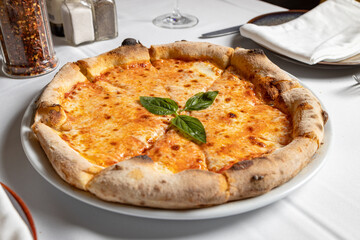 Margherita pizza, served in Italian restaurant
