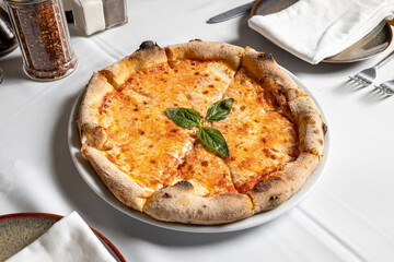 Margherita pizza, served in Italian restaurant