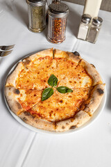 Margherita pizza, served in Italian restaurant