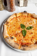 Margherita pizza, served in Italian restaurant