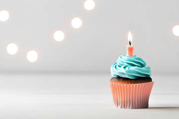 Birthday Cupcake With Candle Isolated On Blurred Lights Background