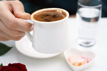 Türk Kahvesi -Turkish coffee in a cup with Turkish delight 