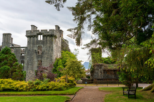 Vegetation covers castle ruins among manicured gardens at Armadale, Scotland, home of Clan Donald; Armadale, Isle of Skye, Scotland