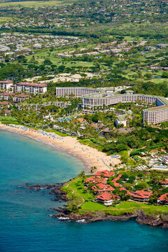 Aerial view of the Resort Community of Wailea with the Grand Wailea Resort and the Wailea Beach at Wailea Point on the Island of Maui; Wailea, Maui, Hawaii, United States of America
