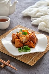 crispy shrimp dumpling in white plate
