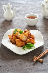 crispy shrimp dumpling in white plate
