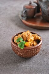 chicken rendang in bowl on the table, Indonesian food