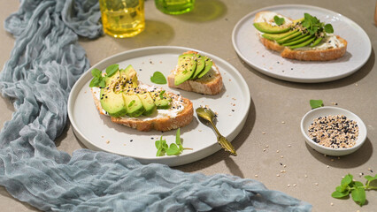 Toast with avocado cream cheese and wheat bread