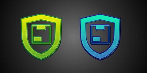 Green and blue Delivery security with shield icon isolated on black background. Delivery insurance. Insured cardboard boxes beyond the shield. Vector