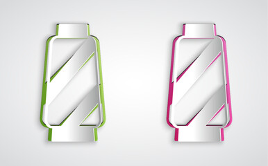 Paper cut Sewing thread on spool icon isolated on grey background. Yarn spool. Thread bobbin. Paper art style. Vector