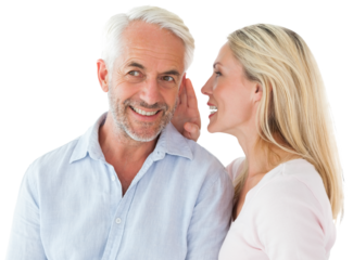 Smiling couple gossiping together