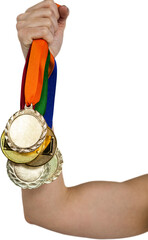 Athlete holding gold medals after victory