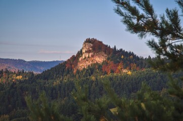Autumn colorful landscape in the Slovak mountains. View of the Trzy Korony peak in the Pieniny National Park from the trail to Wysoki Wierch. © shadowmoon30