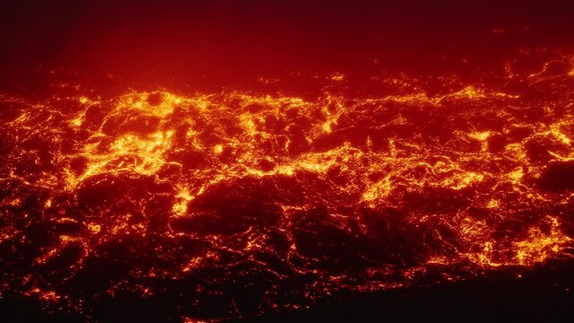 Aerial red hot glowing in dark volcanic lava on Hawaii Big Island. Scenic view of river of natural erupting liquid magma from within earths mantle Kilauea Volcano Hawaii USA. Lava flows on Hawaii 4K