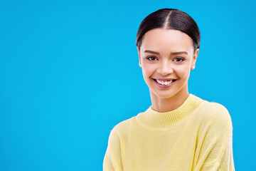 Happy, mockup and portrait of woman in studio for fashion, beauty and natural makeup. Elegant, style and happiness with face of female isolated on blue background for glow, cosmetics and satisfaction