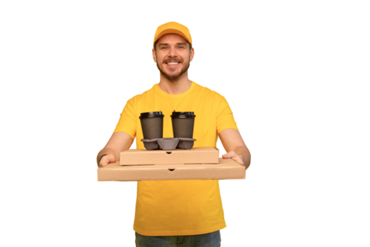 Portrait of young delivery man in yellow uniform with pizza boxes and takeaway coffee isolated over transparent background